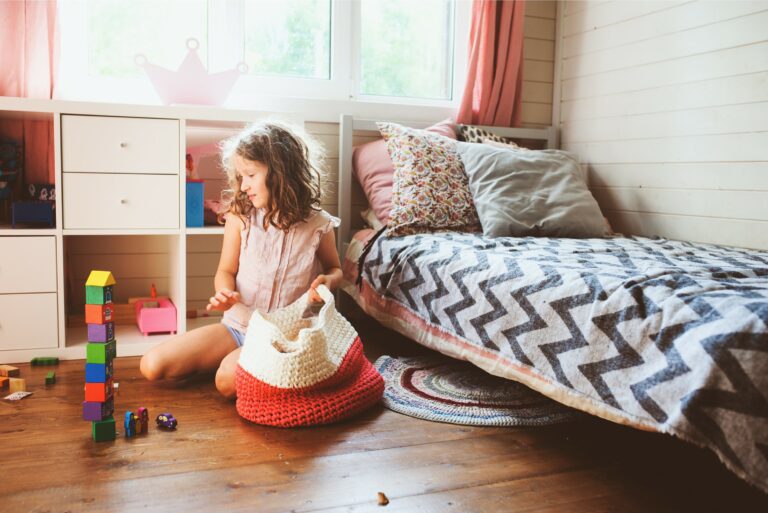 Girl Cleaning Her Toys Room Blocks Organizing